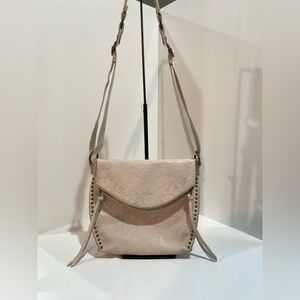 The Sak Embossed Cream Crossbody Bag